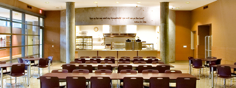 A seating area with seats and tables